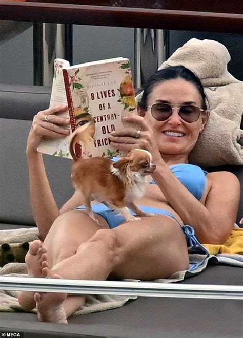 Demi Moore 60 Shows Off Her Incredible Figure In A Skimpy Blue Bikini As She Soaks Up The Sun