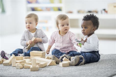 Babies Playing With Blocks