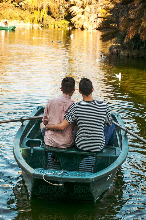 Back View Of Gay Couple Rowing Boat On A Lake By Stocksy Contributor Bonninstudio Stocksy