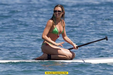 Abigail Clancy Paddleboarding In Green Bikini