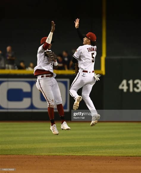 Geraldo Perdomo And Alek Thomas Of The Arizona Diamondbacks Celebrate