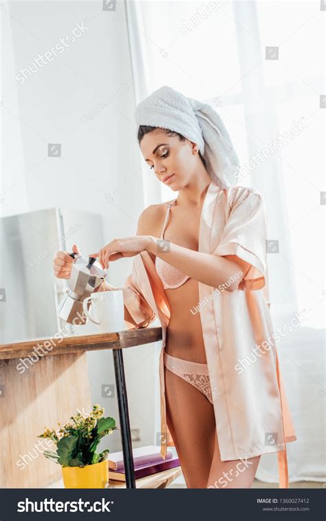 Sexy Woman Lingerie Housecoat Pouring Coffee Stock Photo