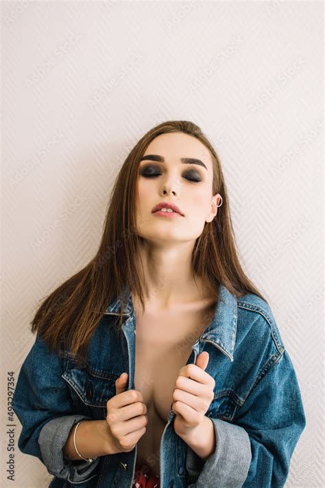 Sexy Brunette Girl Wearing Denim Jacket Photoset Of Attractive Girl Smoky Eyes Stock Photo