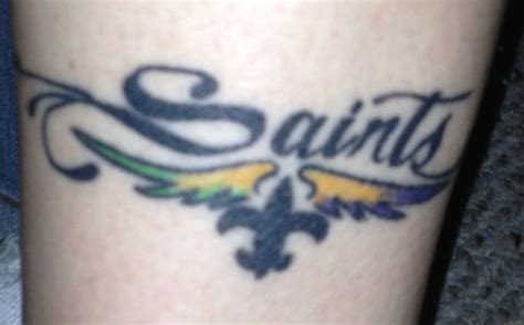 Saints Tat | Tattoo quotes, Print tattoos, Paw print tattoo