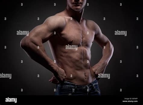 Muscular Naked Man On Black Stock Photo Alamy