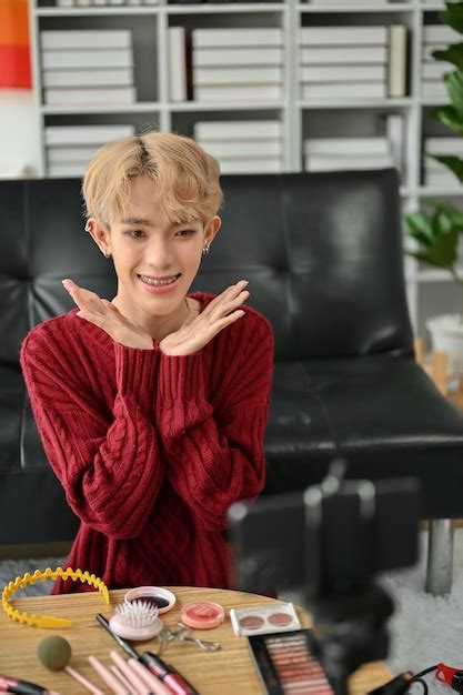 Premium Photo A Cute Asian Gay Beauty Blogger Is Broadcasting His Live Through His Smartphone