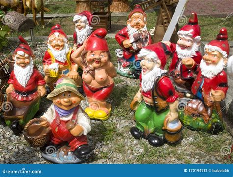 Many Fanny Garden Gnomes And One Dancing Female Nude Gnome Romania Stock Photo Image Of