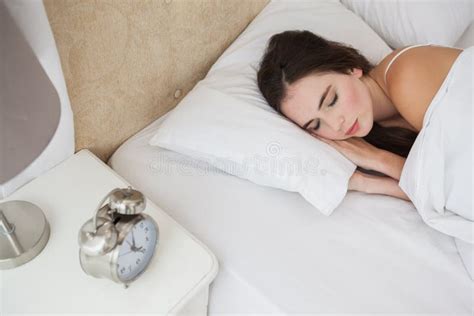 Pretty Brunette Lying In Bed Sleeping Stock Image Image Of Apartment Leisure