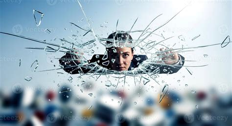 determined businesswoman breaking  glass ceiling symbolizing