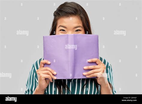 Happy Asian Woman Hiding Behind Stock Photo Alamy