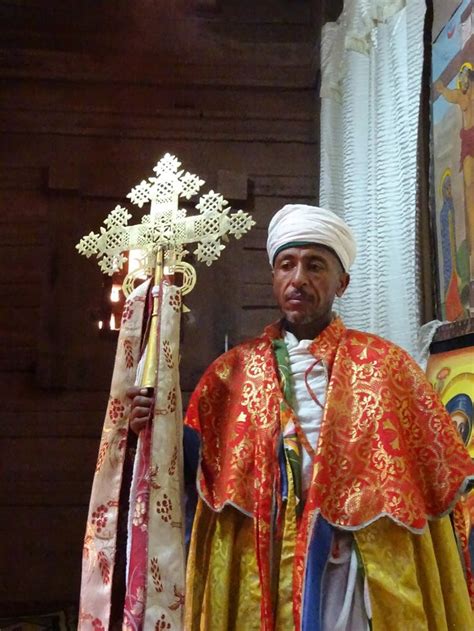 Ethiopian Orthodox priest holding a cross | Orthodox priest, Orthodoxy