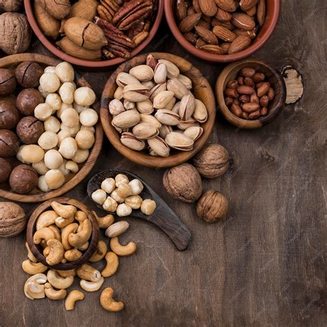 Free Photo | Organic nuts snack in bowls