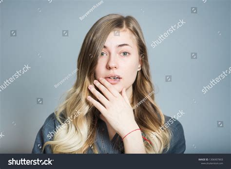Beautiful Blonde Girl Unpleasantly Surprised Isolated Stock Photo 1306907803 Shutterstock