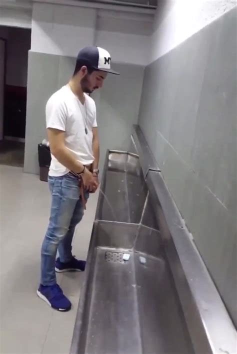HOT GUYS PISSING AT THE URINAL Video ThisVid