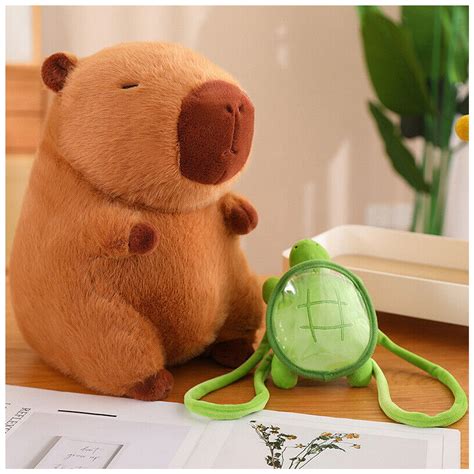 Ripley PELUCHE CAPIBARA CON MOCHILA DE TORTUGA