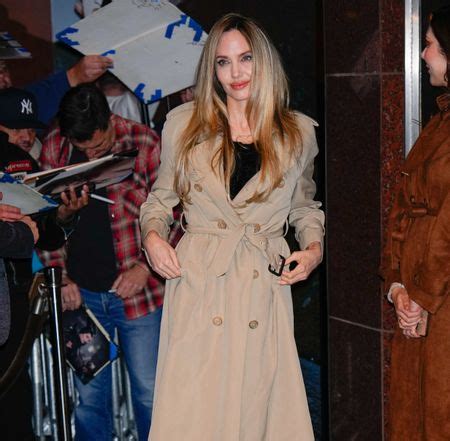 Angelina Jolie Flashes Her Tattoo Collection In A Backless Nude Slip Dress And Slingback Heels