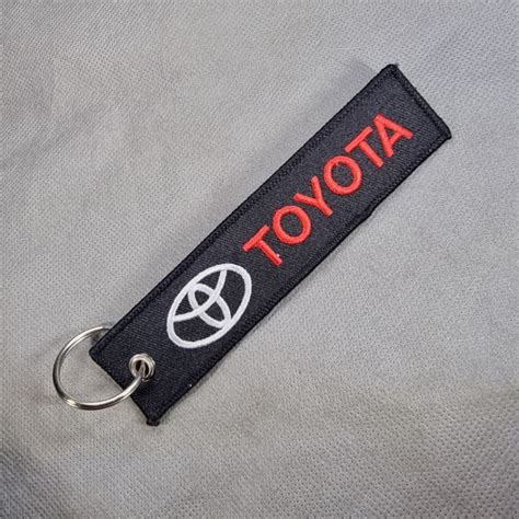 Limited Stock Motorsport Automotive Brand Woven Fabric Cloth Keychains