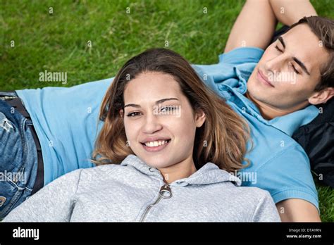 Young Woman Lying Grass Hi Res Stock Photography And Images Alamy