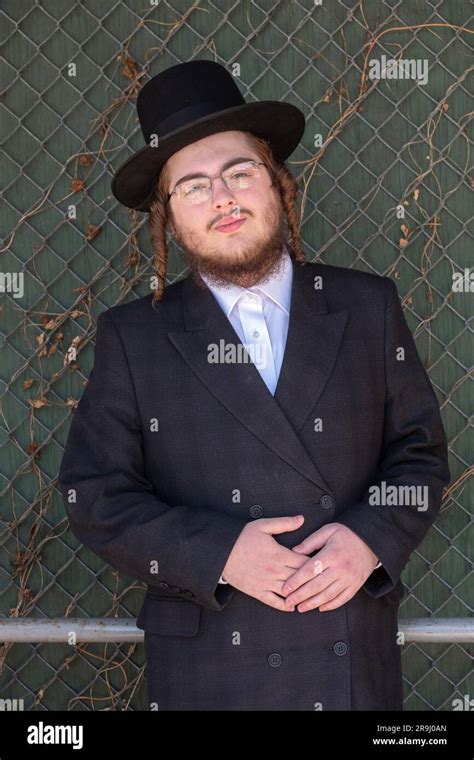 Posed Portrait Of A Hasidic Young Man In Brooklyn New York Spring