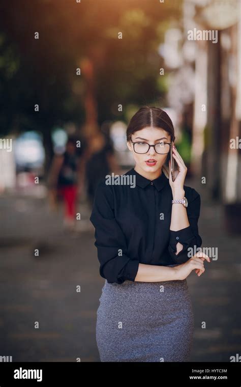 Beautiful Brunette With Glasses Stock Photo Alamy
