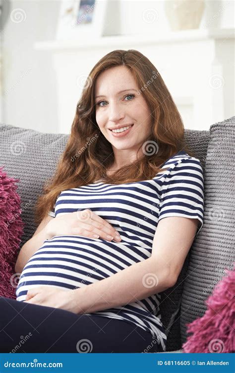 Pregnant Woman Relaxing On Sofa At Home Stock Image Image Of Resting