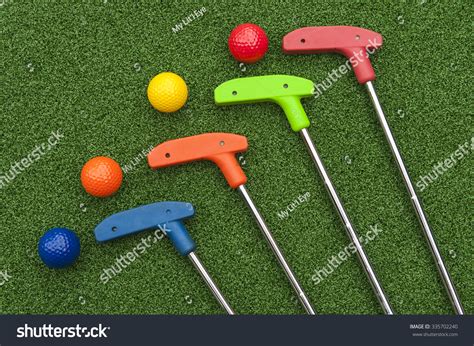 Four Mini Golf Putters Balls Assorted Stock Photo 335702240 - Shutterstock