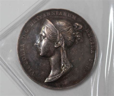 A Silver Medallion Commemorating The Coronation Of Queen Victoria 1838
