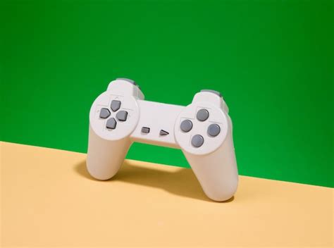 Premium Photo Gaming Joystick And Having Fun Gamepad And Console Games