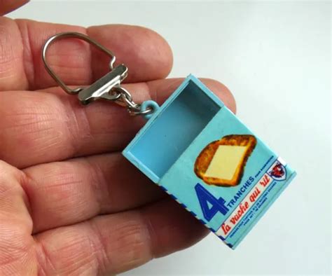 ANCIEN PORTE CLÉ Fromage La Vache Qui Rit 4 Tranches Mobile Années 60