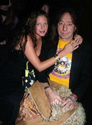 Ace and Monique Frehley step into the Baby Phat Fall Fashion Show ...