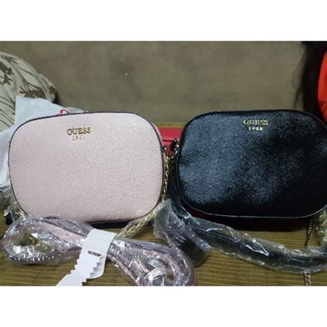 กระเป๋าสะพายข้างยี่ห้อ Guess แท้ Shopee Thailand