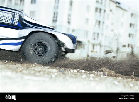 Rapidly Whirling Wheel Of A Radio Controlled Cars Stock Photo Alamy