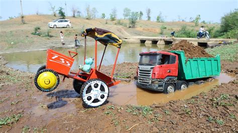 Scania Tipper Stuck In Mud Pulling Out Sonalika Tractor Tata Dumper