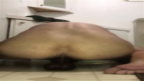 Tight White Ass Rides Black Dildo