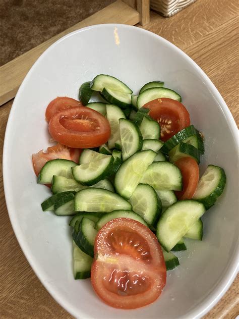 A Tomato And A Whole Ass Cucumber Absolutely Slathered In Salt Because Ya Girl Wants Some