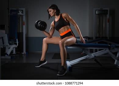 Bodybuilding Woman Exercising Dumbbells Muscular Brunette Stock Photo 1088771294 Shutterstock