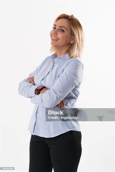 Portrait Of Smiling Business Woman With Folded Hands Isolated On White