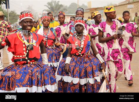 Cotonou, Benin. 17th Feb, 2023. People take part in a parade during the