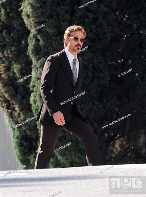 Ryan Gosling puts on a vintage suit for a scene in his new movie 'The ...