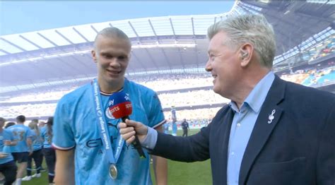 Erling Haaland leaves on-pitch interview with to dance with Man City ...