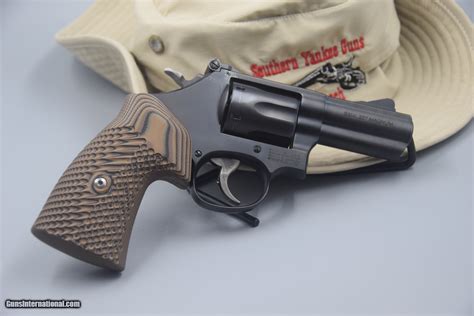 S W PERFORMANCE CENTER MODEL 19 CARRY COMP 3 INCH 357 PORTED MAGNUM