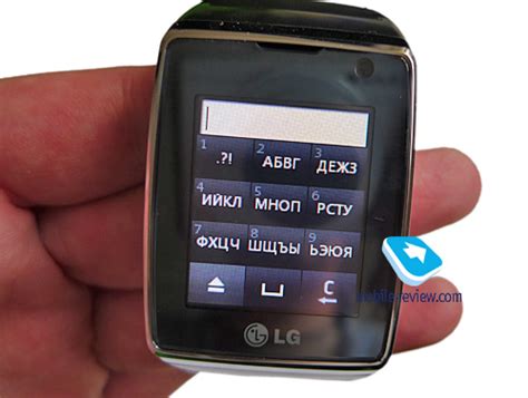 Mobile-review.com Обзор телефона в часах LG GD-910