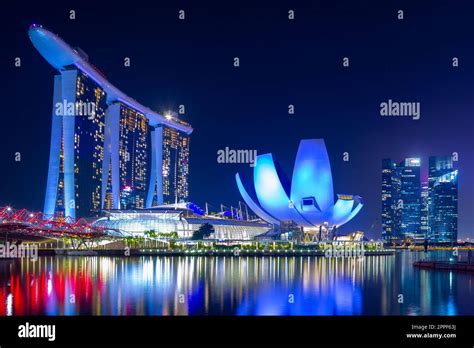 A night view of Marina Bay in Singapore, including the Marina Bay Sands ...