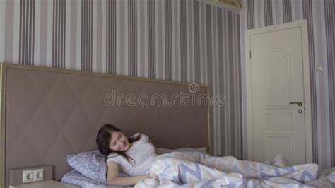 Beautiful Brunette Woman Wakes Up In Her Bed Stock Footage Video Of Laziness Homey