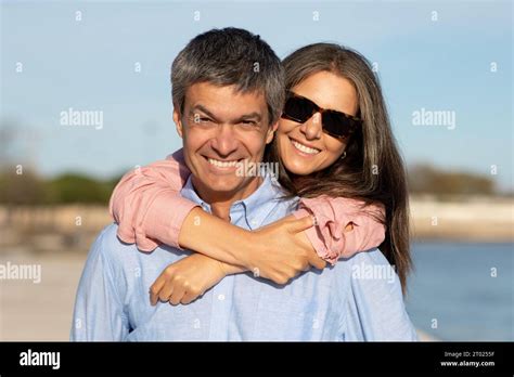 Portrait Of Beautiful Happy Mature Couple Posing Outdoors Near Sea Stock Photo Alamy