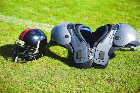Premium Photo Football Gear On Grass