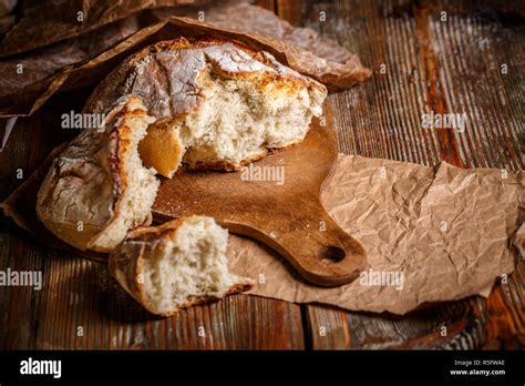 Broken Loaf Of Bread Stock Photo Alamy
