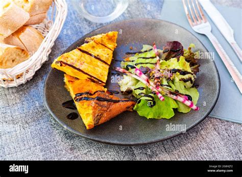 Traditional Spanish Potato Chorizo Tortillas With Lettuce Closeup Stock