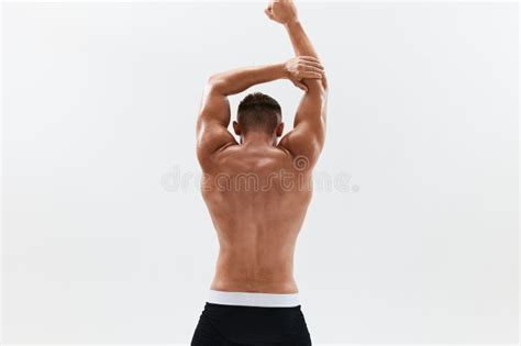 Man Athletic Body Bodybuilder In Briefs With Naked Torso Abs Full Length In The Background