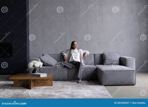 Feeling Lazy Pretty Girl In Nightie Lingerie With Feather In Long Hair